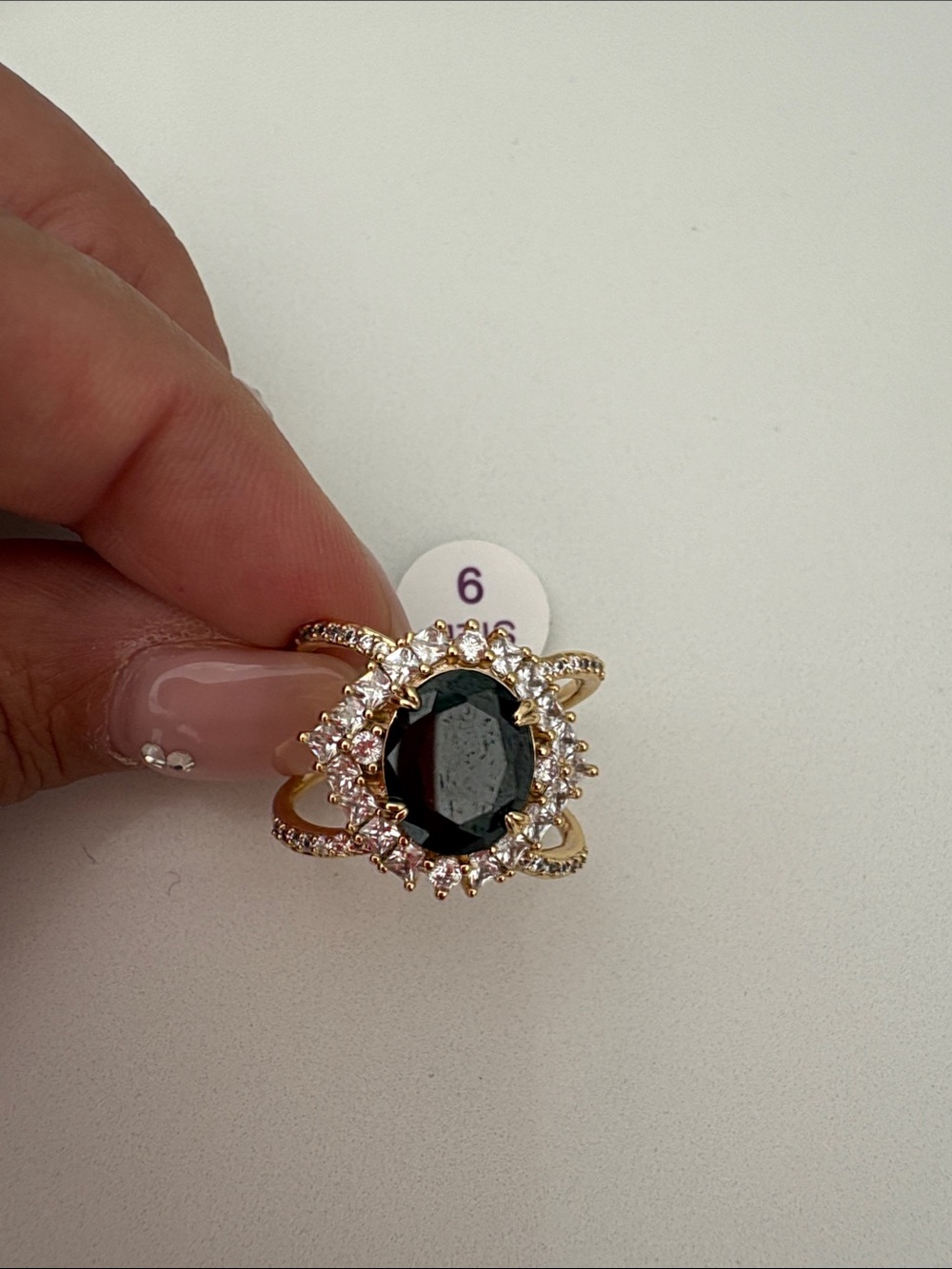 Gold Halo Ring with Black Oval Stone